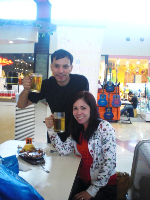 Me and Raquel (sister-in-law), drinking at the Food Court